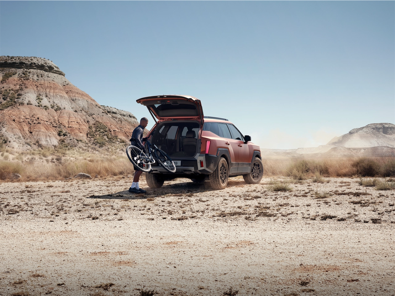 Tucson XRT PRO with liftgate open at a campsite