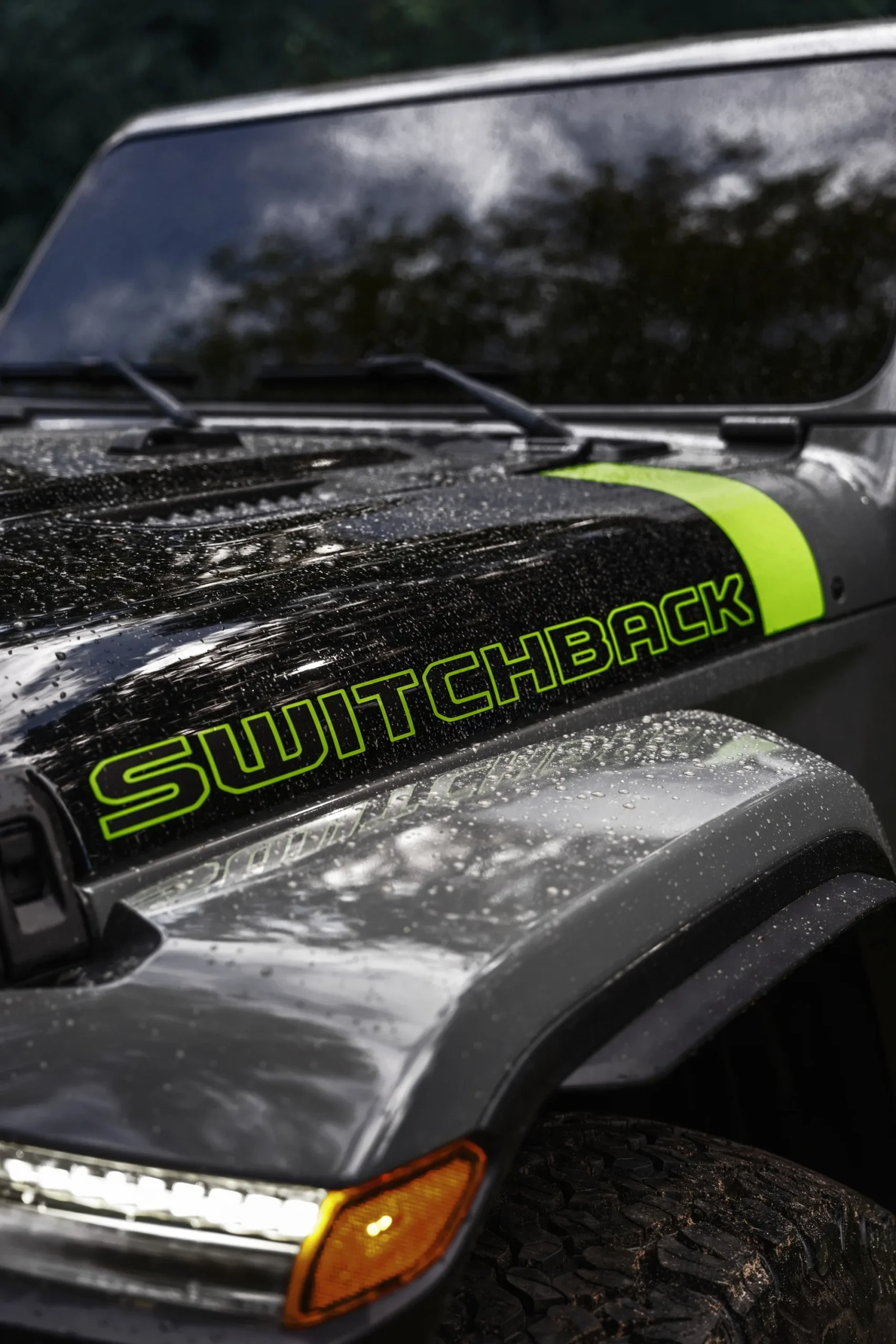 Switchback hood graphic on a black Jeep Wrangler
