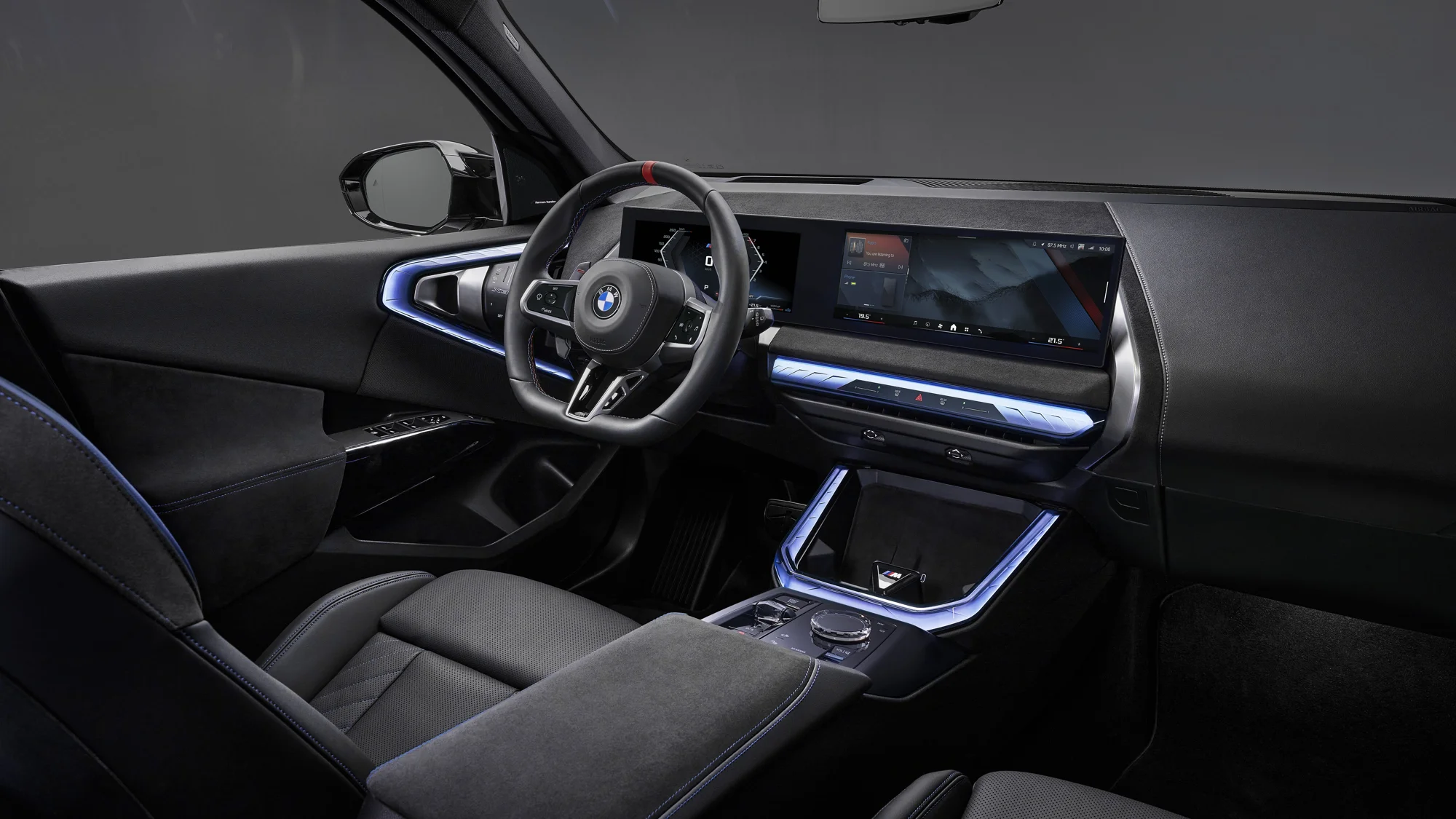 2027 BMW X3 M50 dashboard and curved display with Black Package interior trim