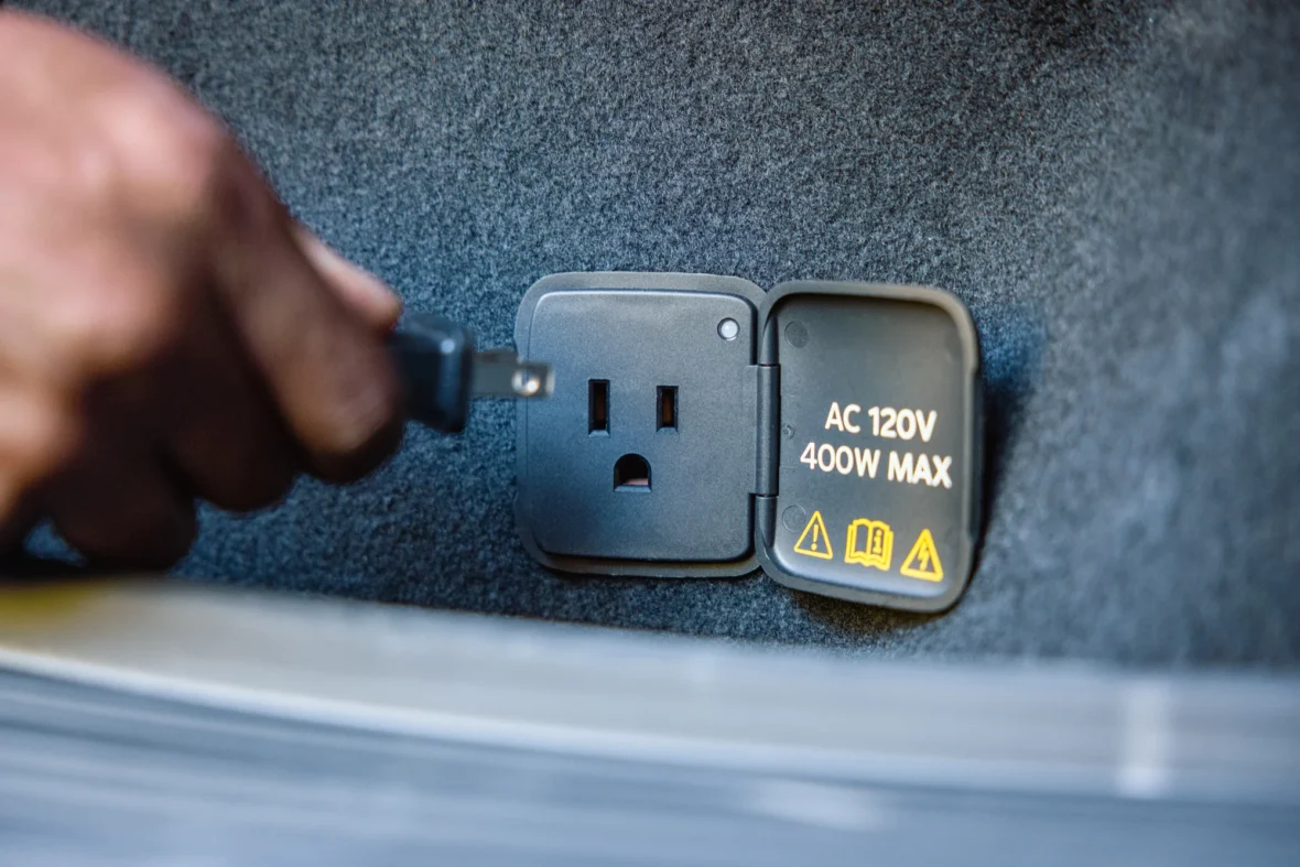 400W Pro Power Onboard outlet in the cargo area of the 2027 Mustang Mach-E Trail