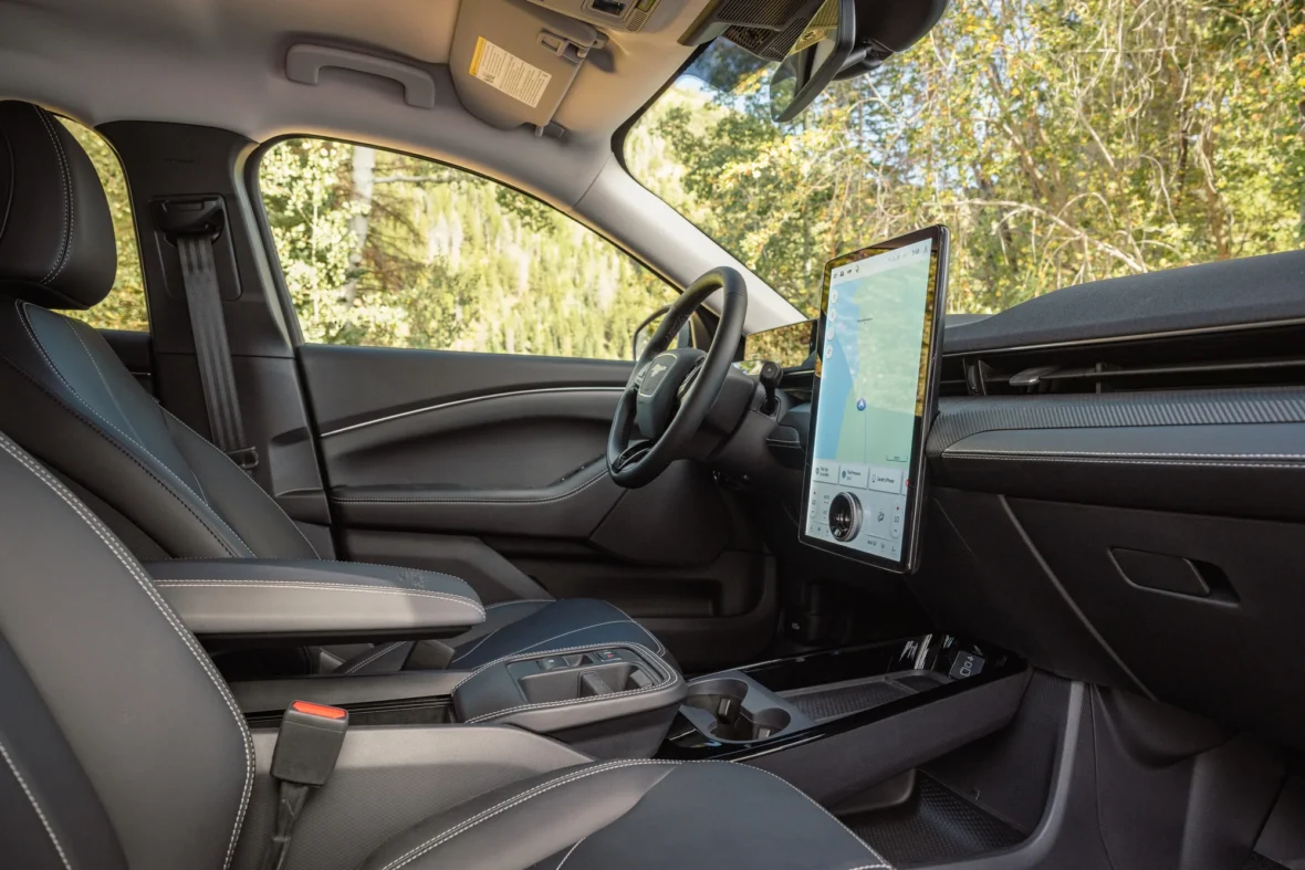 Front seats and large center touchscreen inside the cabin