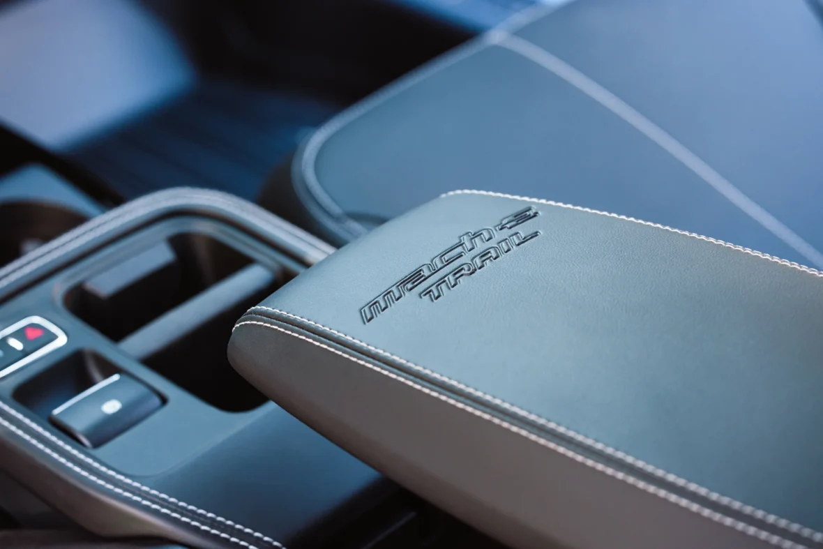 Trail logo stitched on the center armrest