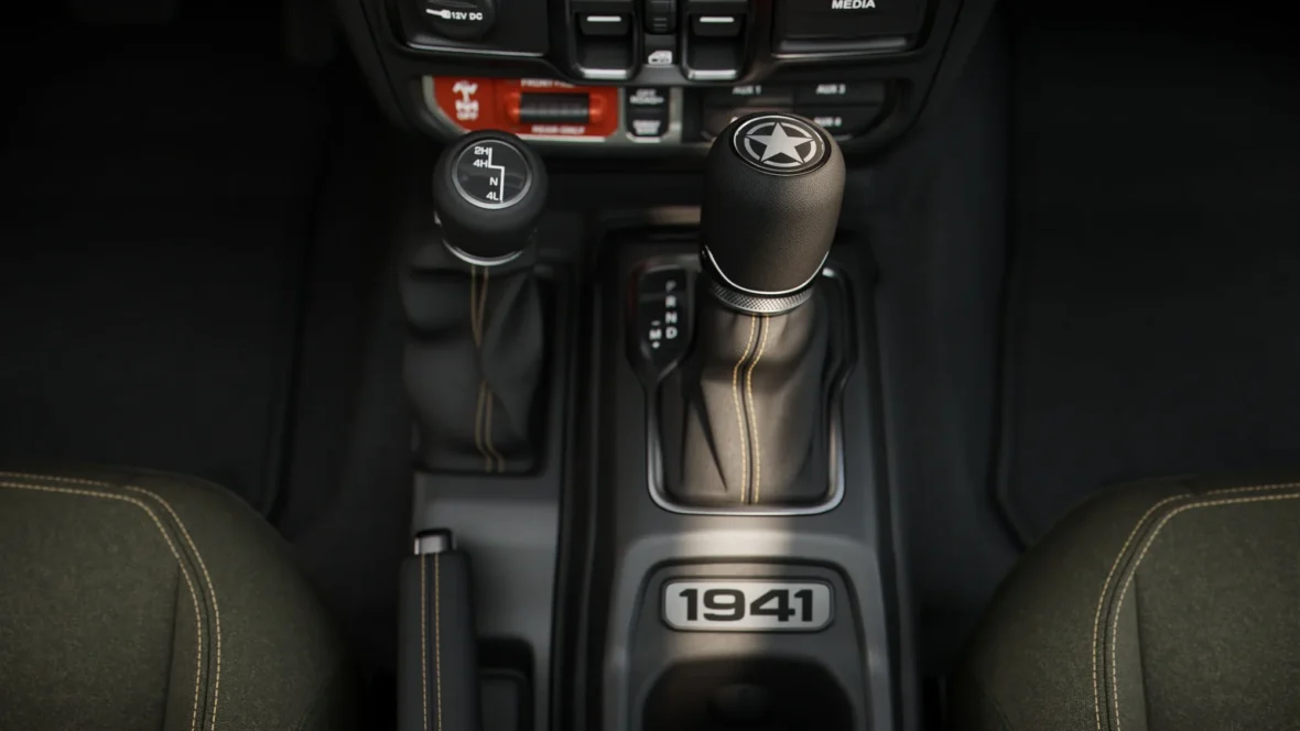 1941 badge on the center console of a 2027 Jeep Sarge edition