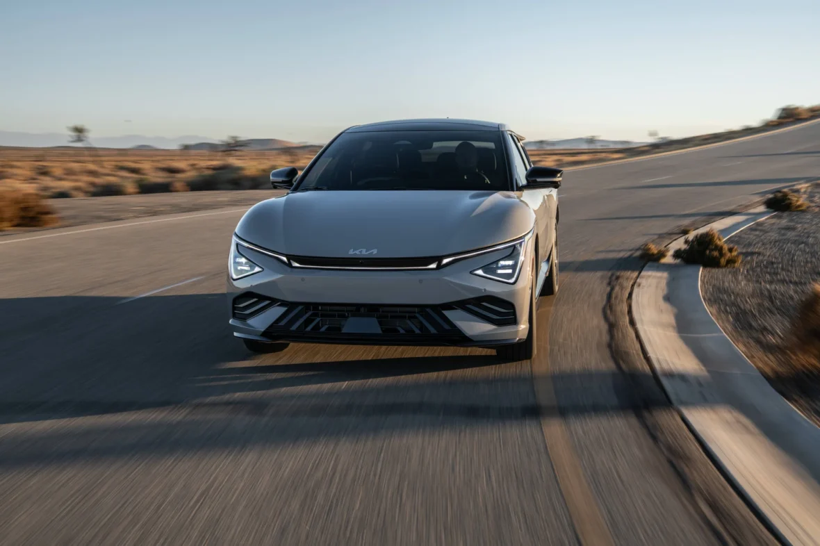 2027 Kia EV6 GT-Line front view driving through a curve