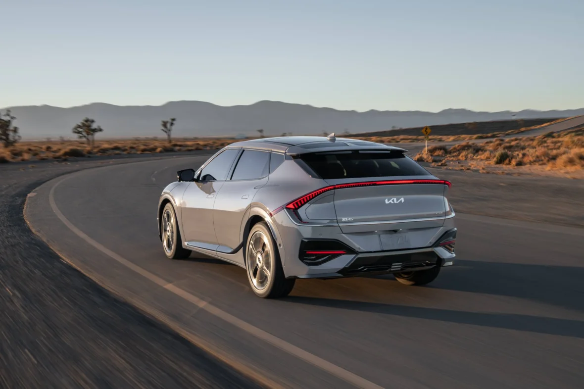 2027 Kia EV6 GT-Line rear three-quarter view on the road