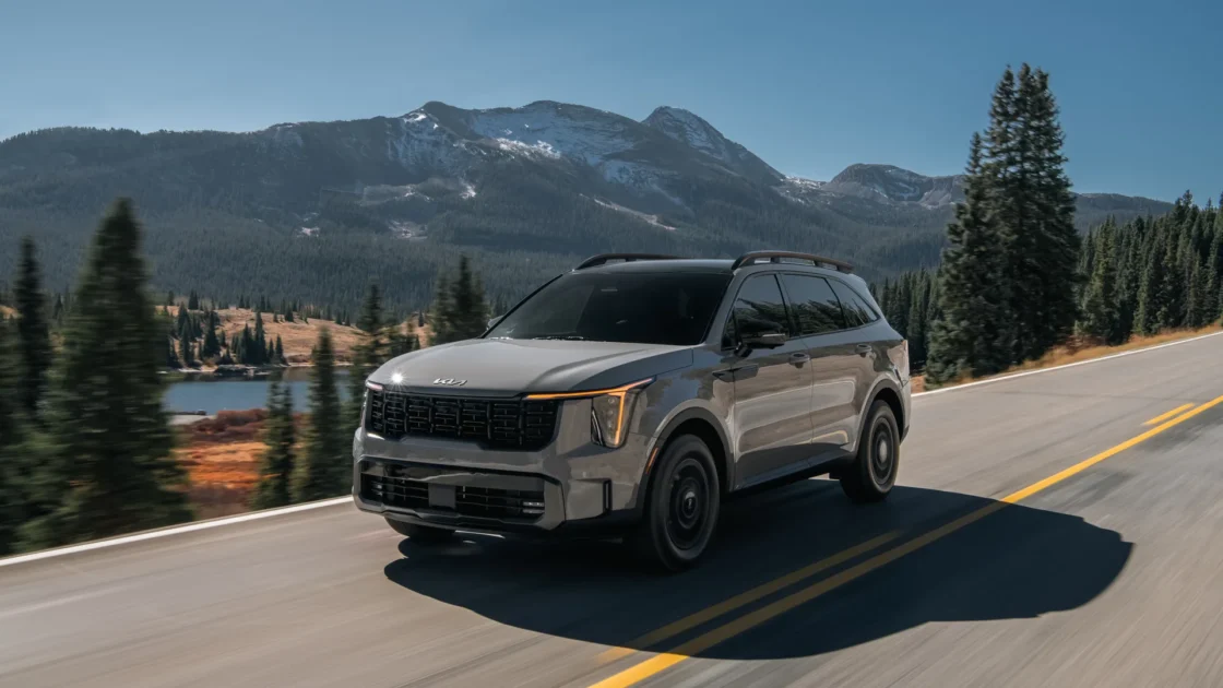 2027 Kia Sorento driving on a mountain road