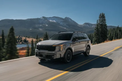 2027 Kia Sorento driving on a mountain road