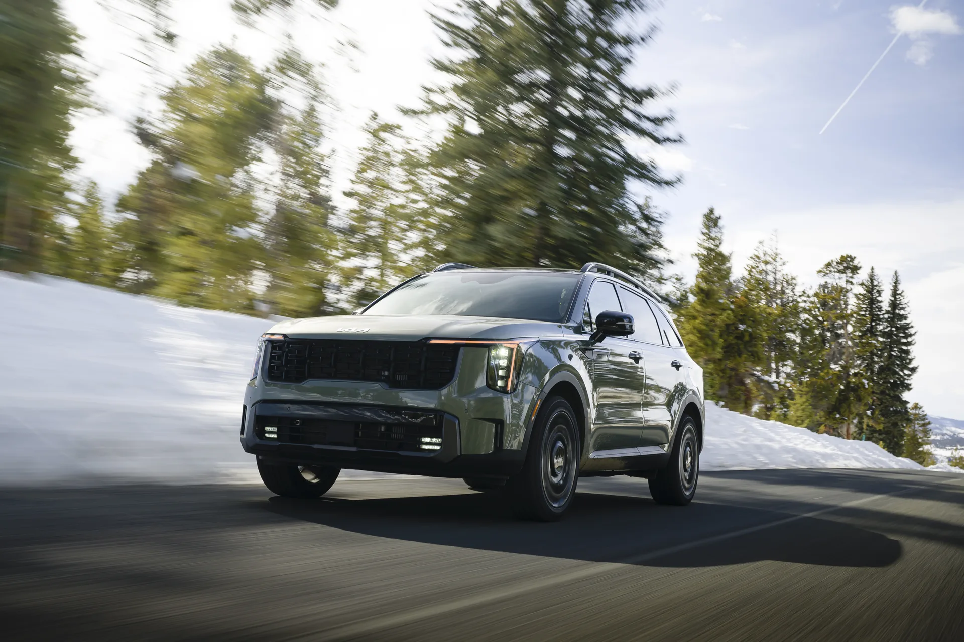 2027 Kia Sorento driving on a snowy road