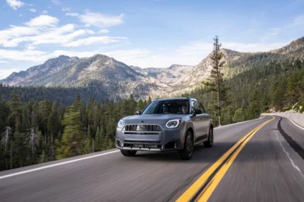 2027 MINI Countryman Untamed Edition driving on a mountain road