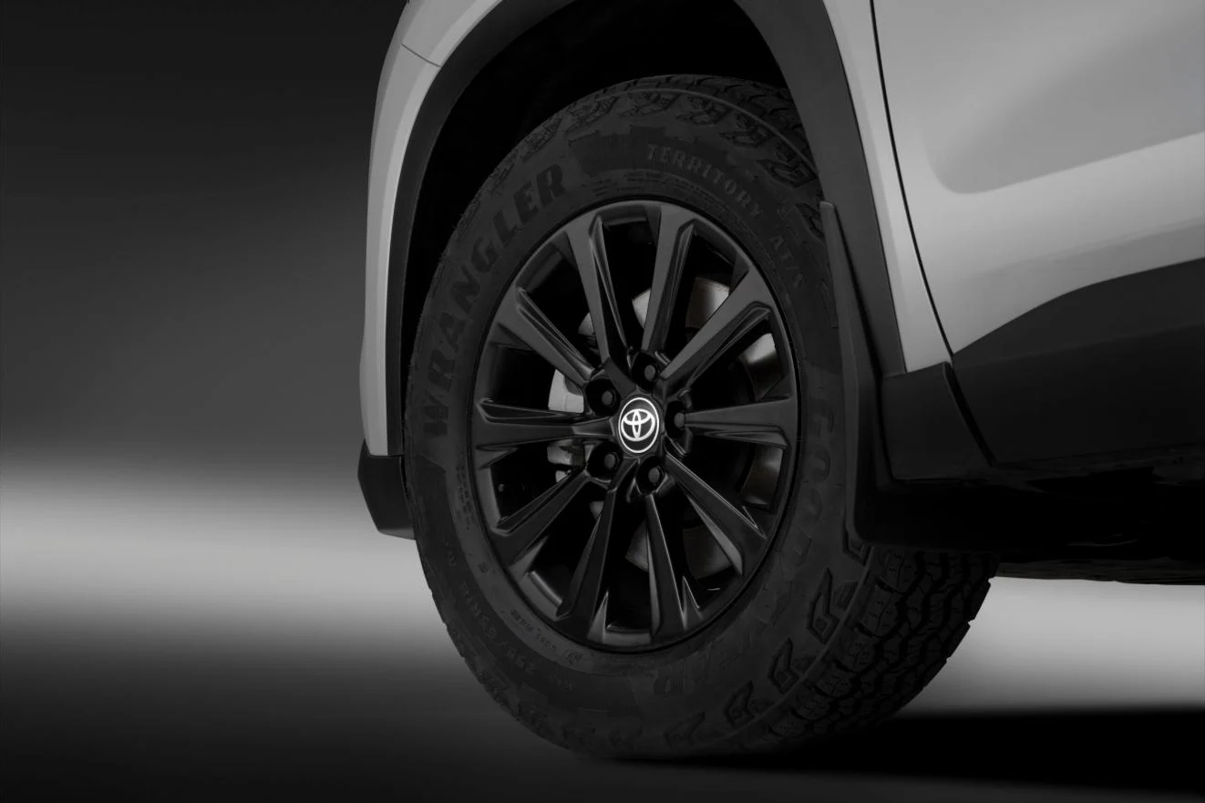 Matte black wheel and all-terrain tire on the 2027 Toyota Grand Highlander Woodland Edition