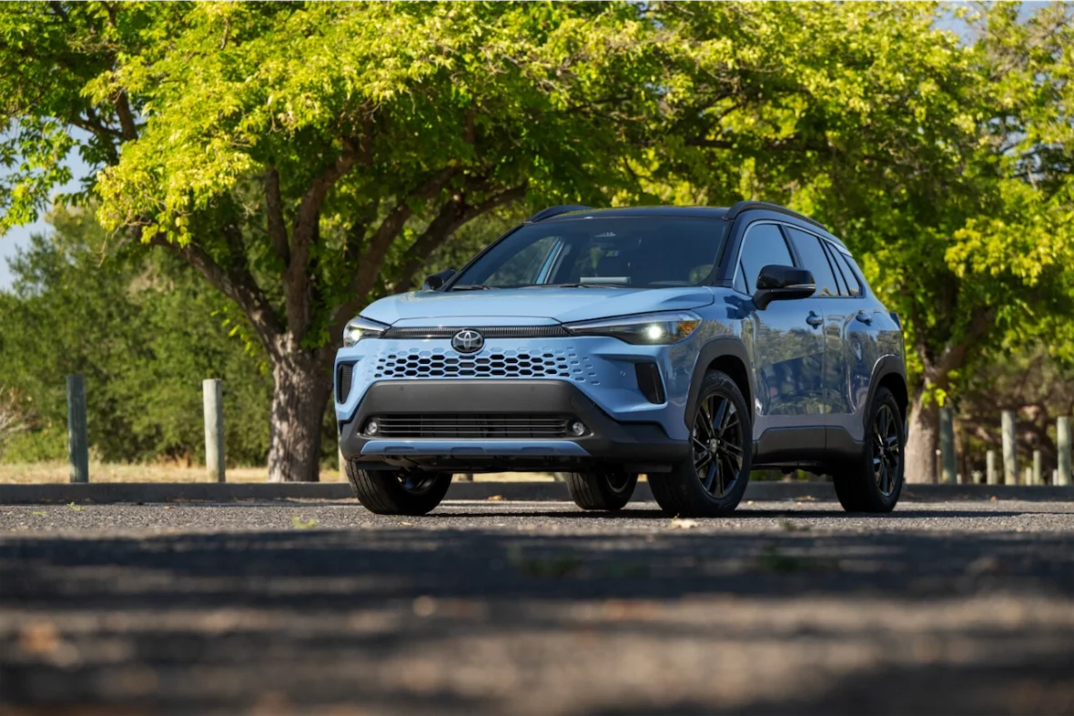 Corolla Cross Hybrid XSE parked under trees