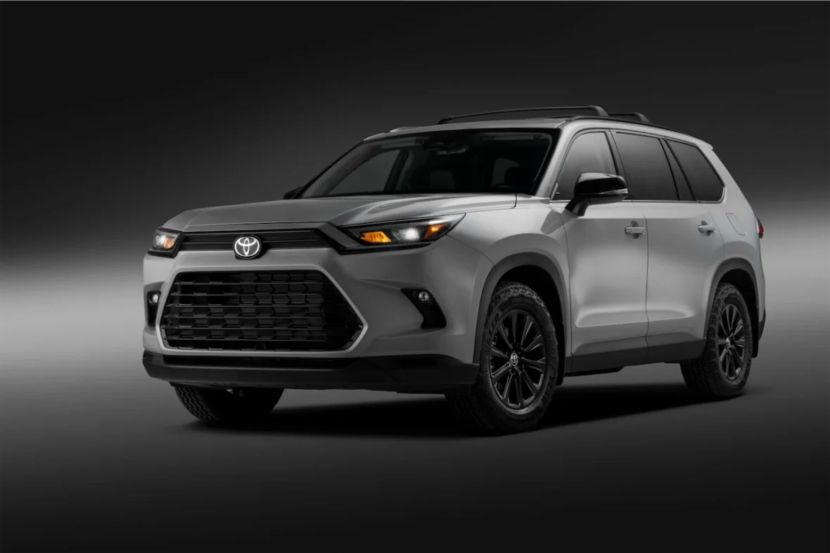 Front view of the 2027 Toyota Grand Highlander Woodland Edition in a dark studio
