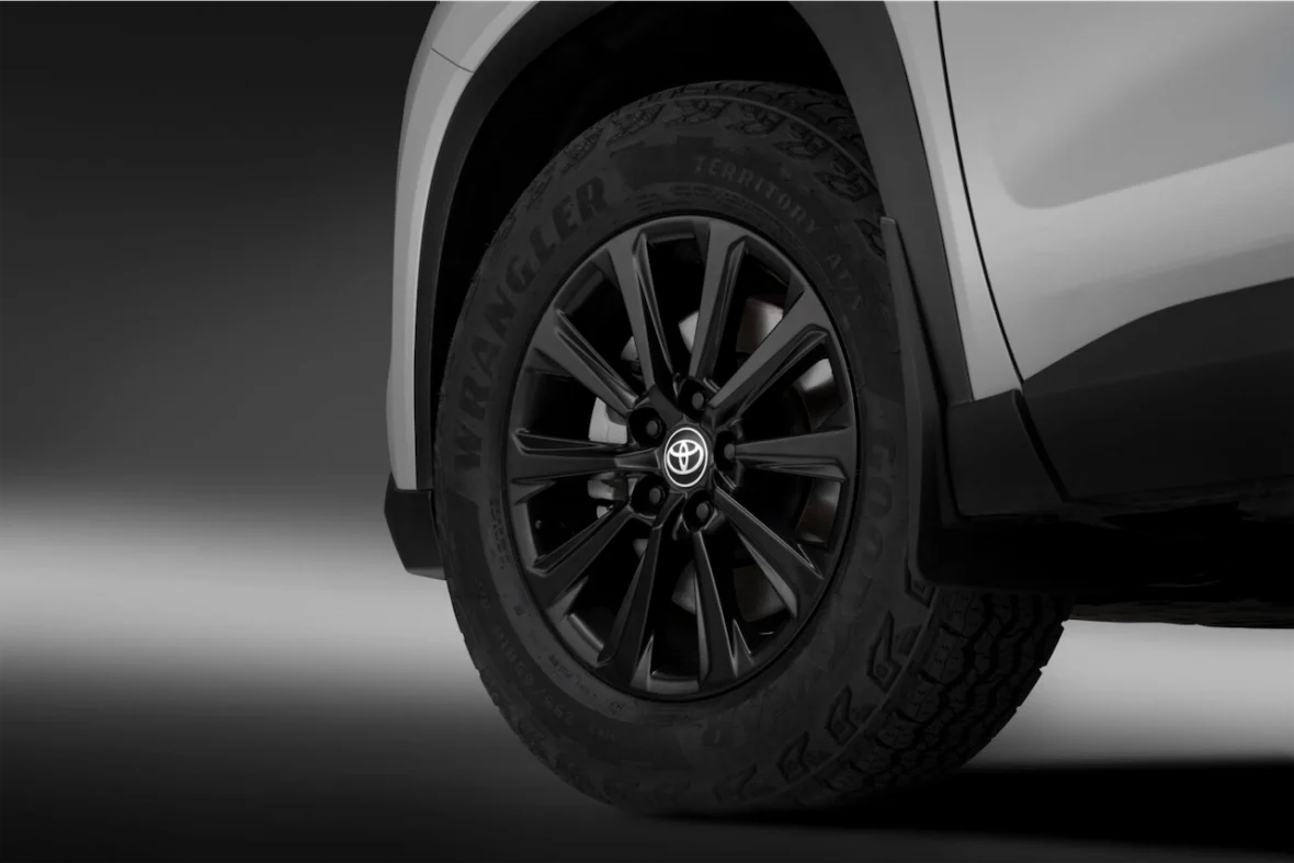 Matte black wheel and all-terrain tire on the Woodland Edition