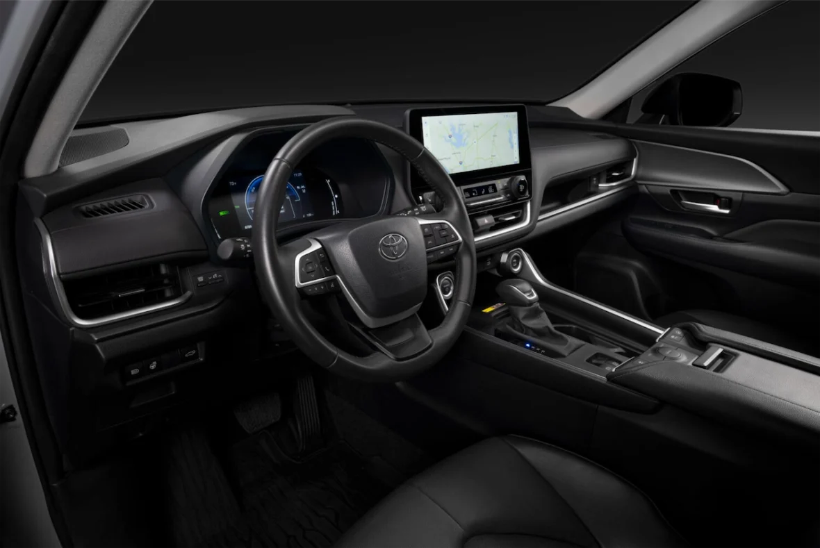 Cockpit view of the steering wheel and center stack