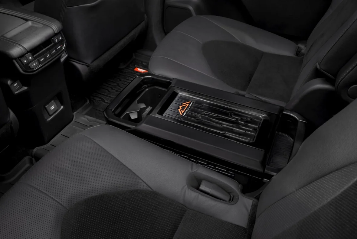 Second row with a console between the seats