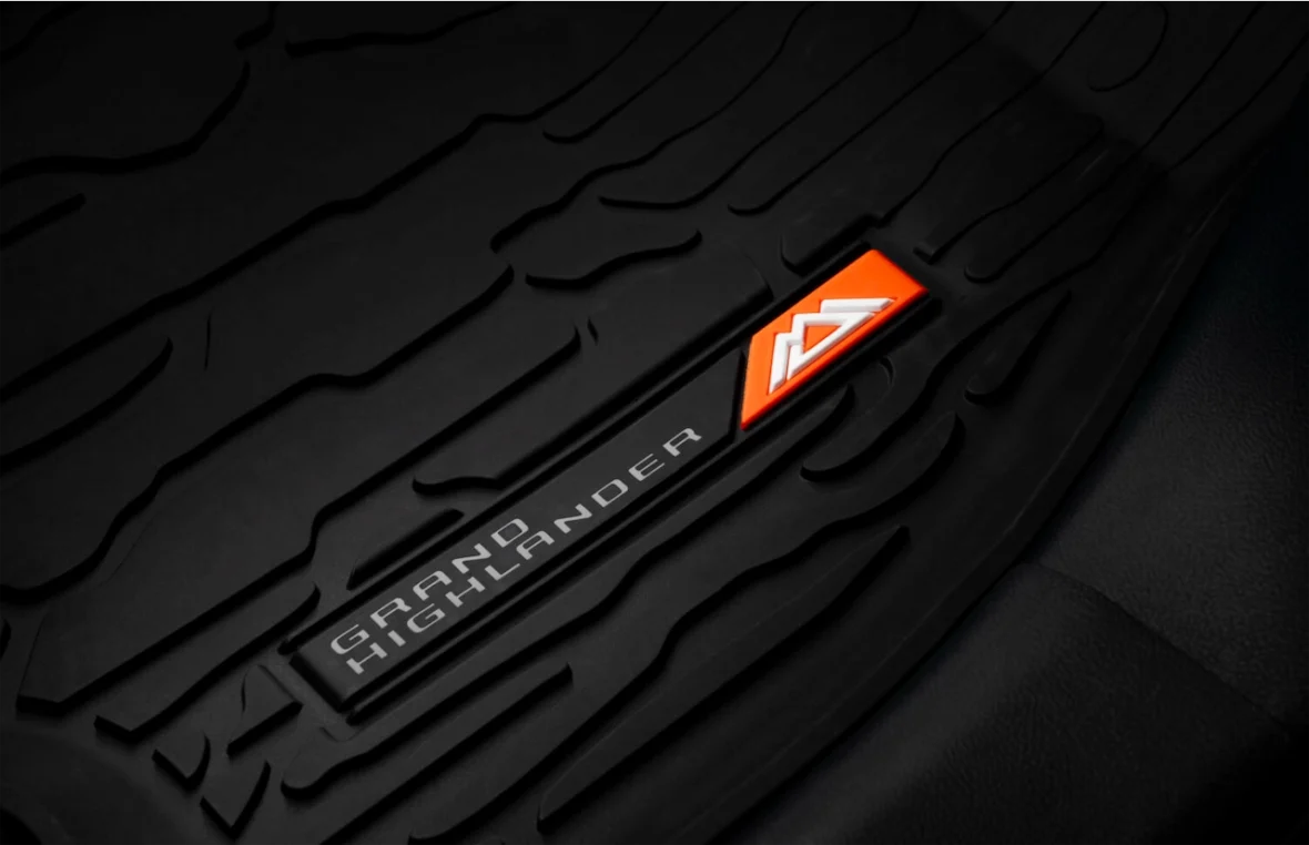 Rubber mat with Grand Highlander lettering in the Woodland Edition