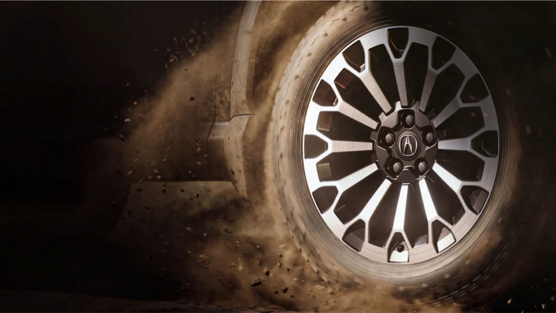 Teaser of a rugged wheel and tire for the new Acura adventure-ready SUV