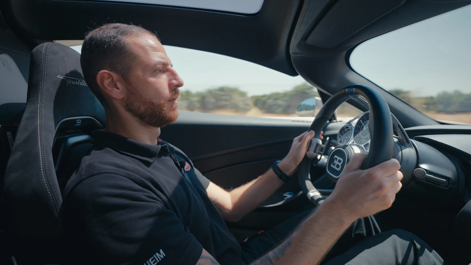 Bugatti Rimac development driver Paolo Magrone behind the wheel of the Tourbillon