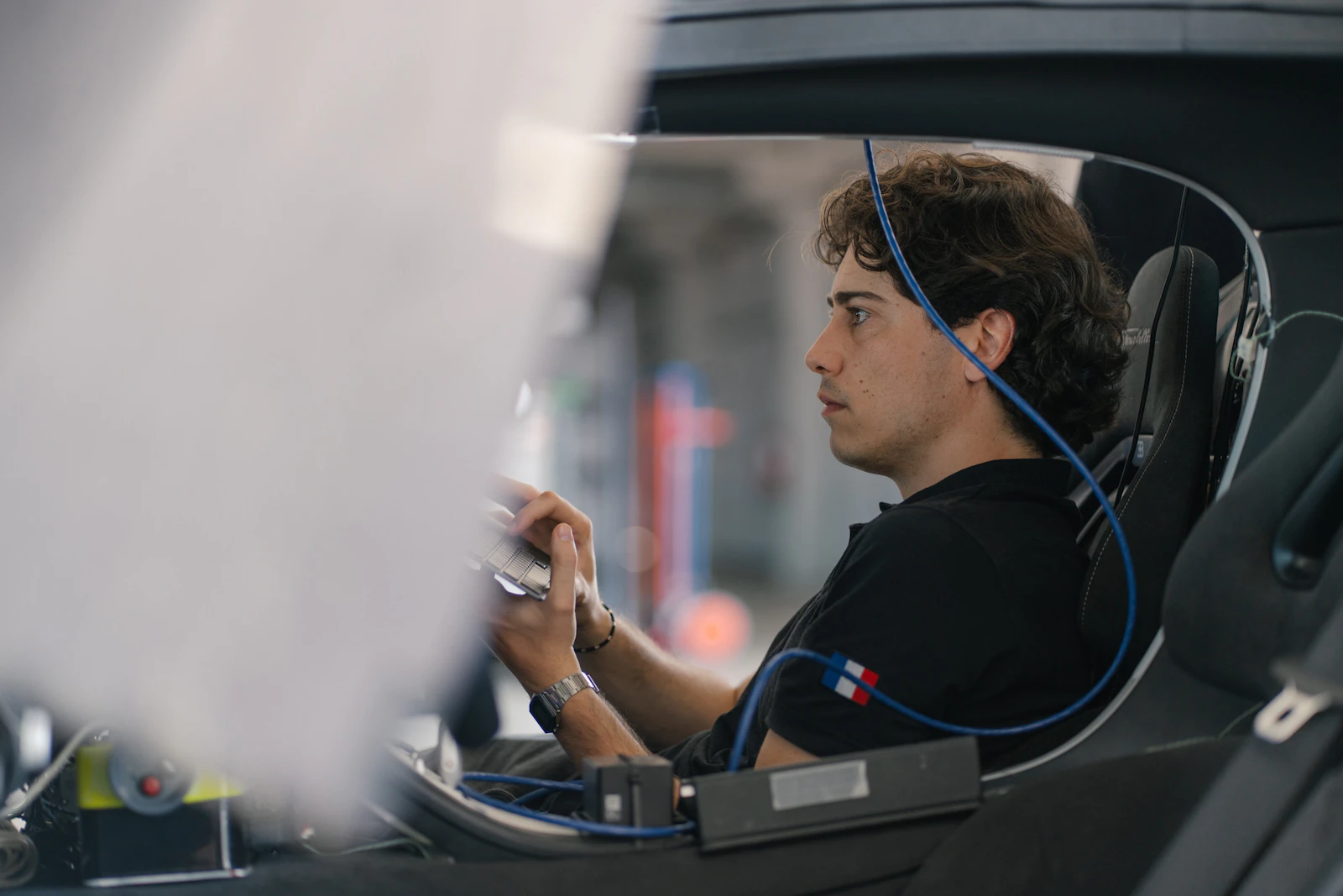 Bugatti Rimac engineer Daniel Rios Hidalgo monitoring Tourbillon test data