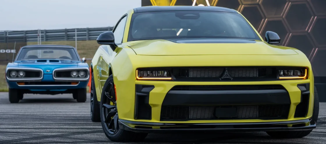 2027 Dodge Charger Super Bee parked beside a classic Dodge Super Bee, as a Charger Hellcat V8 return is reported