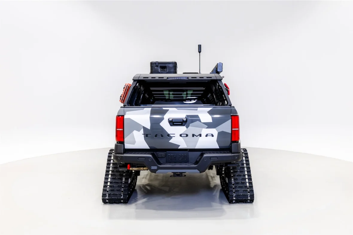 Tacoma pickup concept on white snow tracks