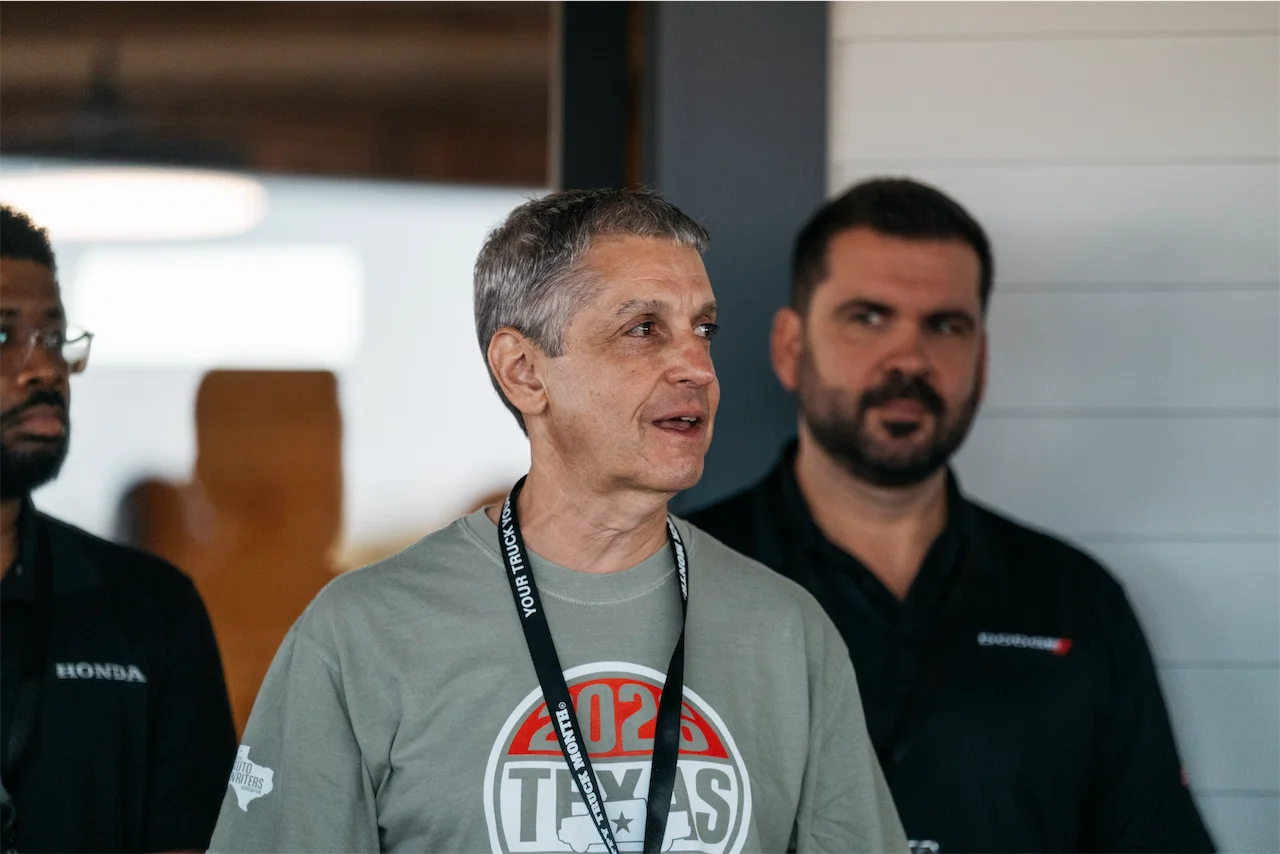 A speaker addresses Texas Truck Rodeo attendees