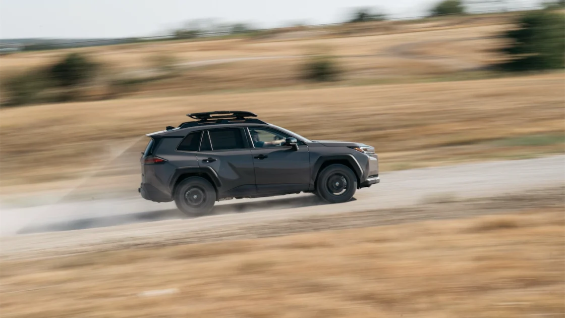 2026 Toyota RAV4 PHEV Woodland kicking up dust on a dirt rally course