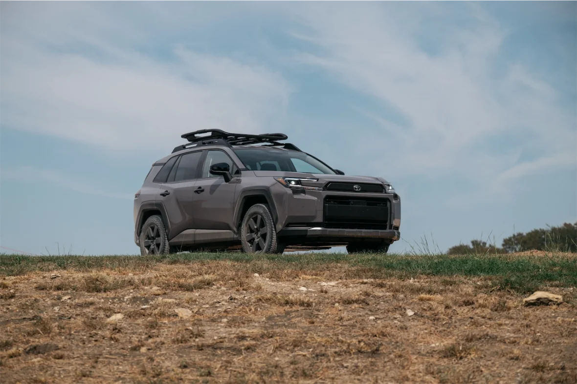 2026 Toyota RAV4 PHEV Woodland on a grassy hill