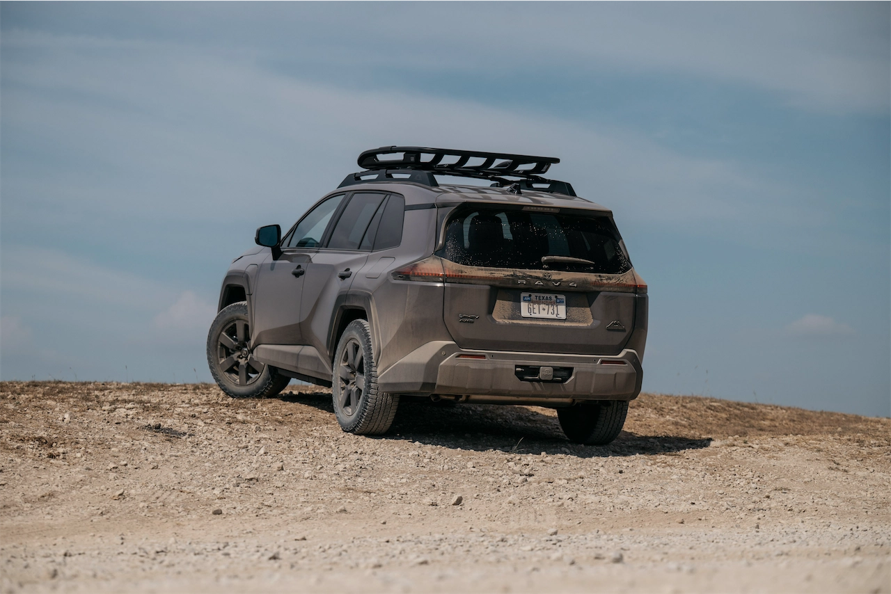 Rear three-quarter view of the 2026 Toyota RAV4 PHEV Woodland