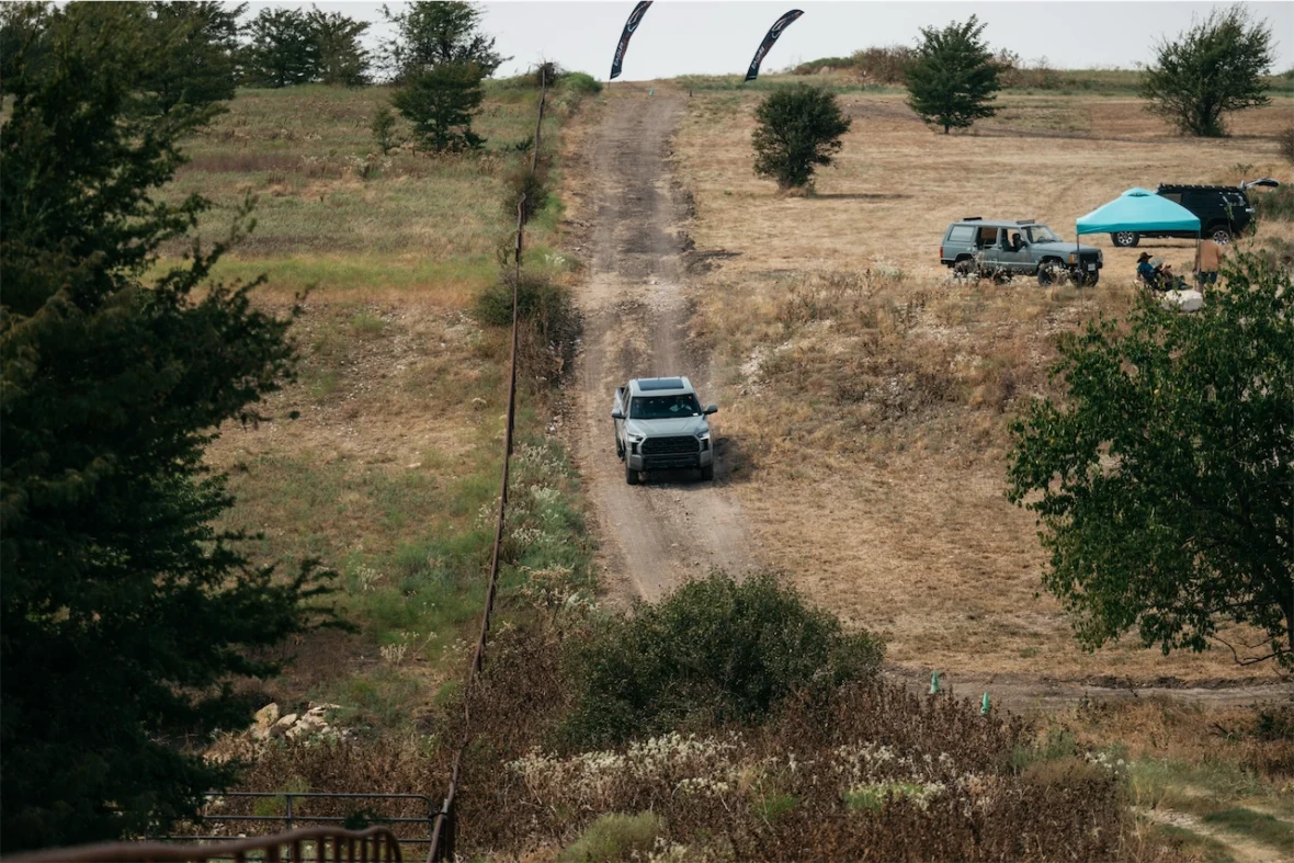 2027 Toyota Tundra Trailhunter descending a narrow dirt trail
