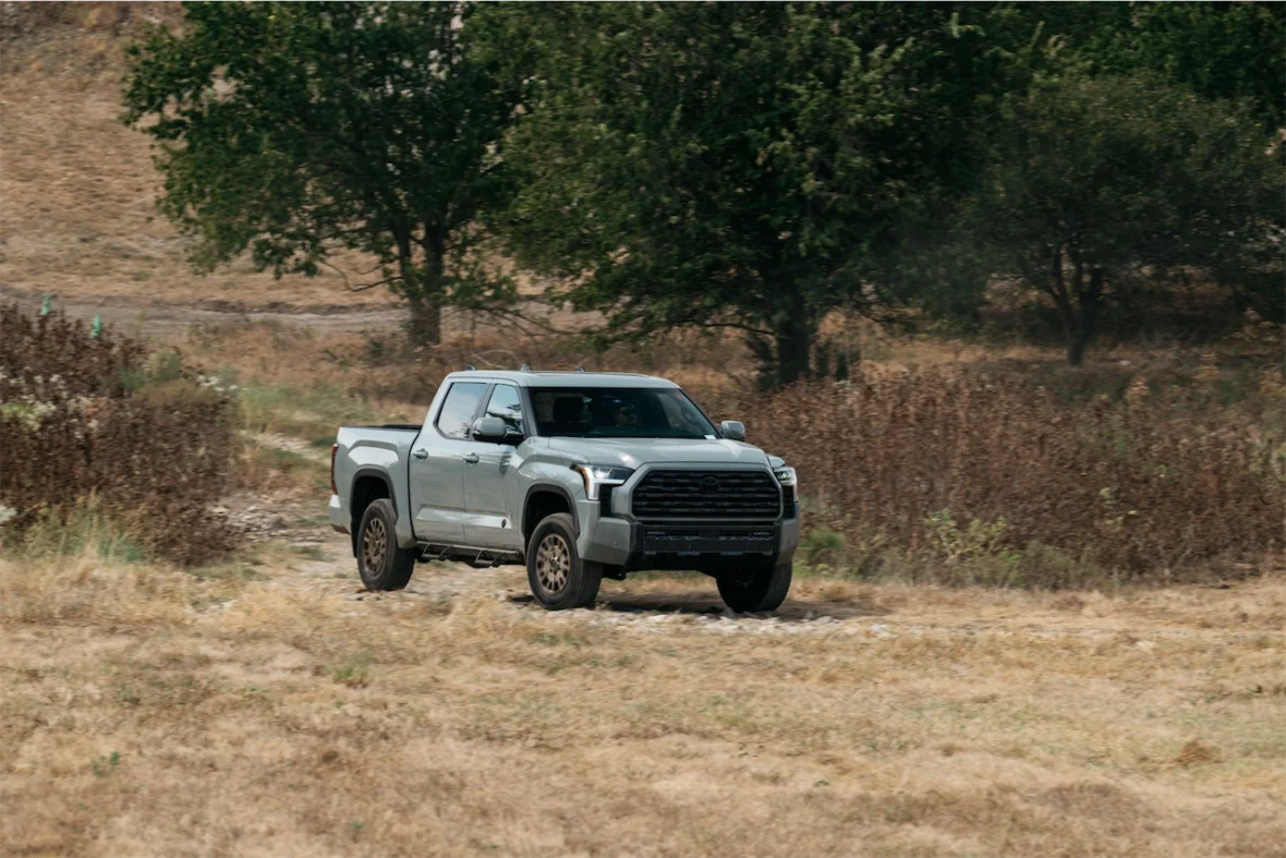 Front view of the 2027 Toyota Tundra Trailhunter on dry grass