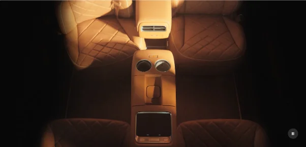Overhead view of the rear console, cupholders, and heated armrests
