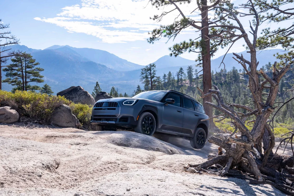MINI Countryman Untamed Edition climbing over granite on a forest trail